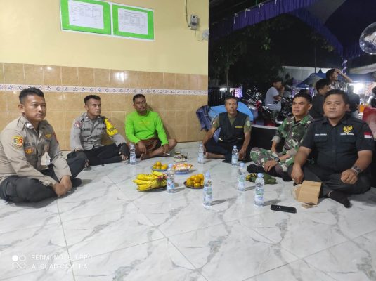 Polsek Sindang Bersama Personil Koramil 1602 Sindang Melaksanakan Pengamanan Kegiatan Adat Desa