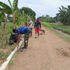 Anggota Satgas TMMD Ke-126 Lanjutkan Pembangunan Jalan Rabat Beton
